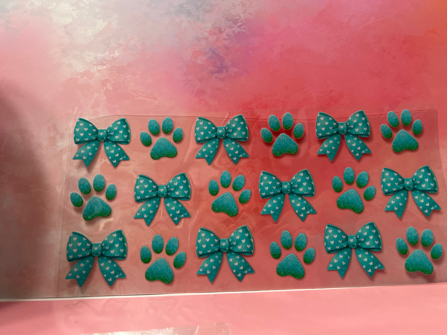 #728 Teal bows & paw prints
