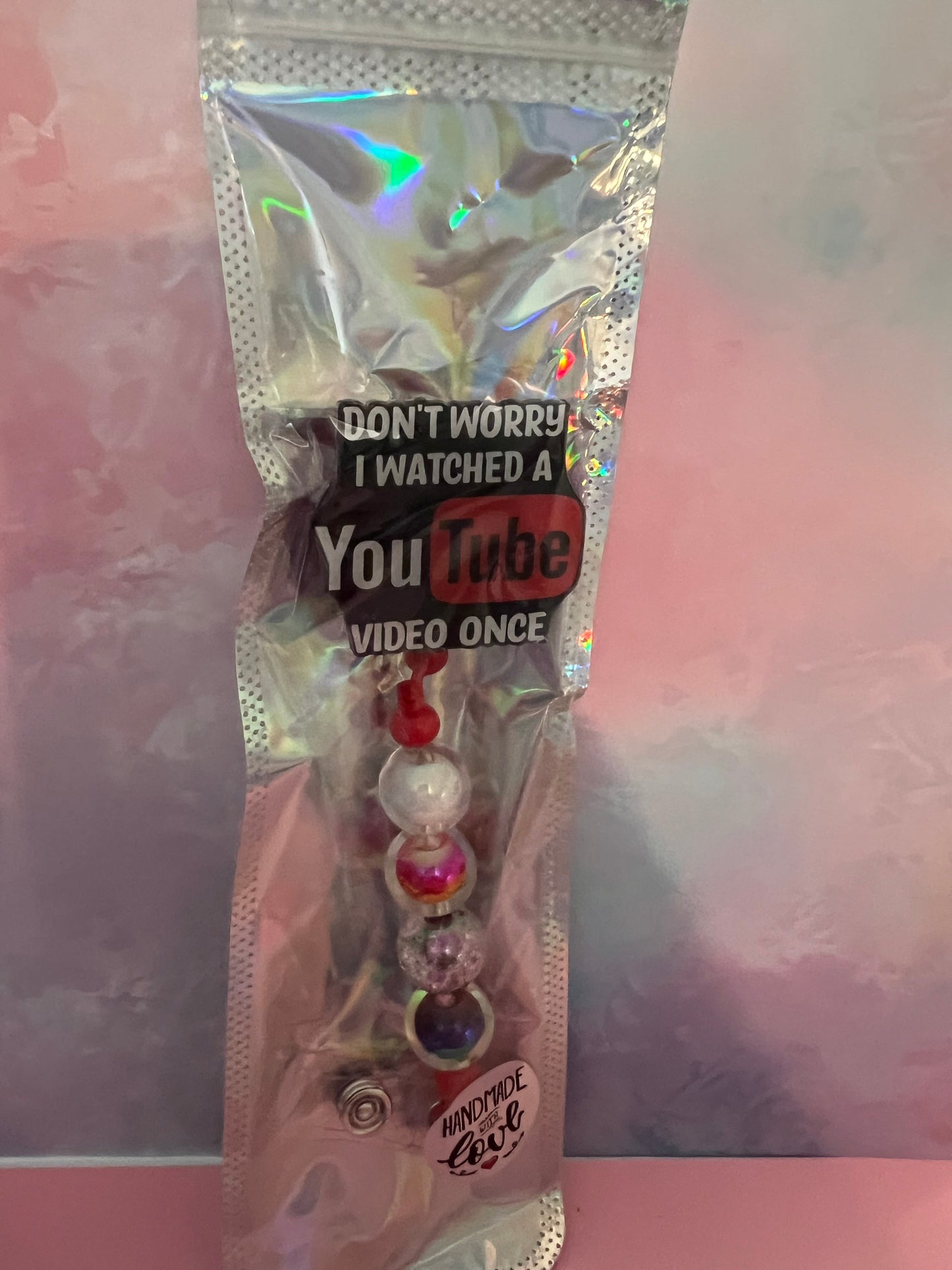 Badge reels various sayings