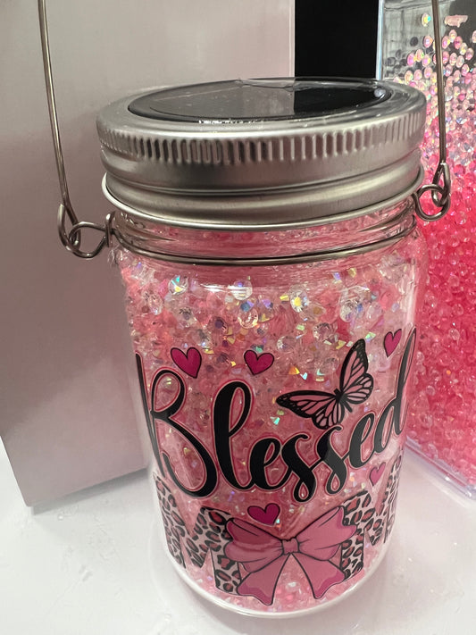 11oz blessed mom Snowglobe glass tumbler/solar light.