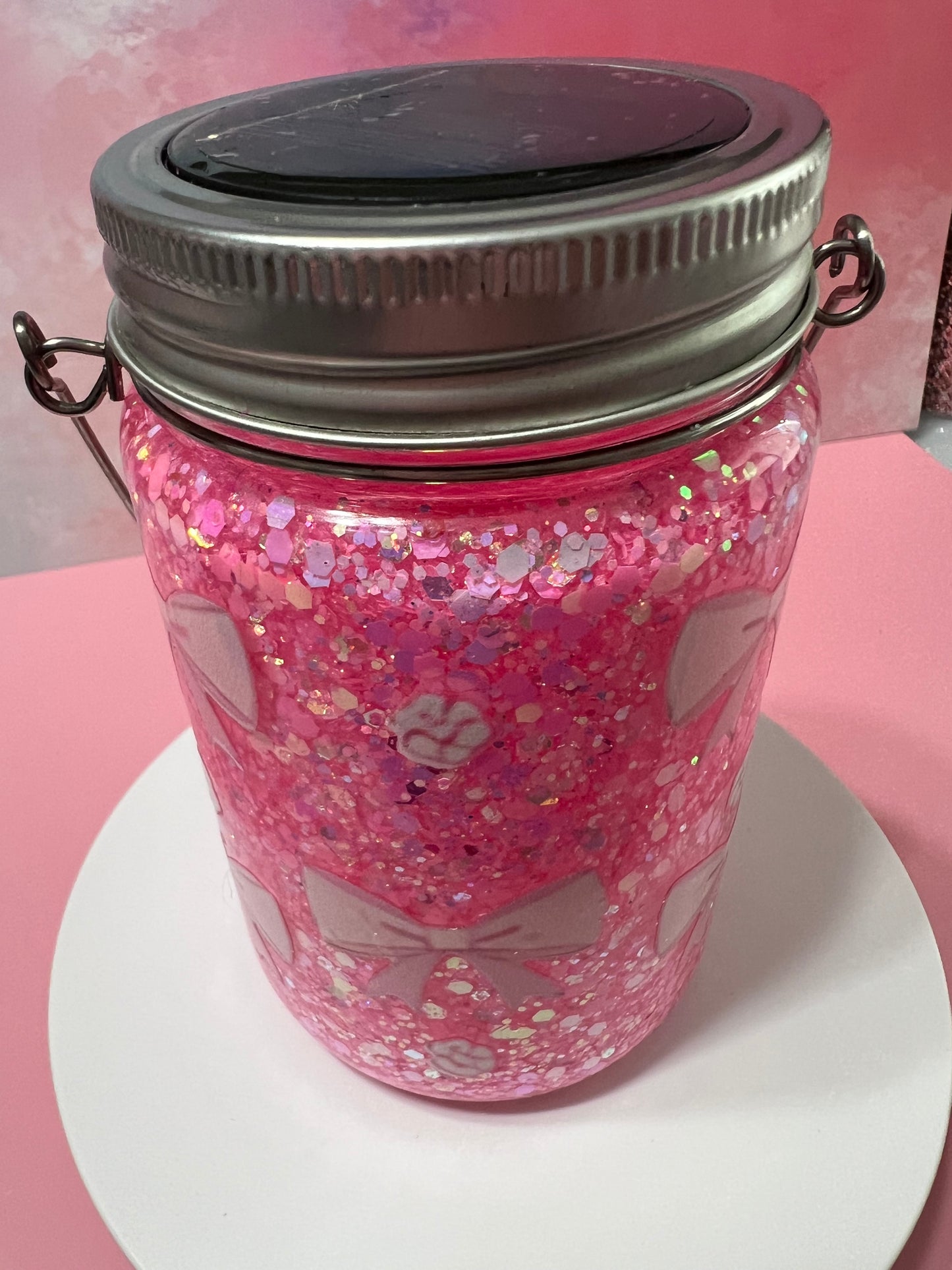 Pink bows & glitter glass snowglobe tumbler/solar light