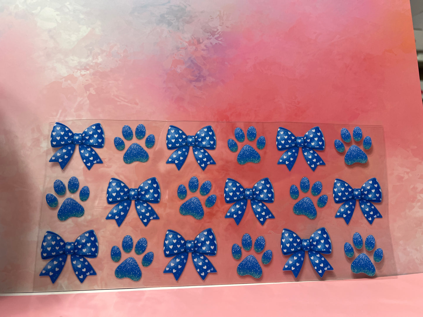 #733 Blue bows & paw prints