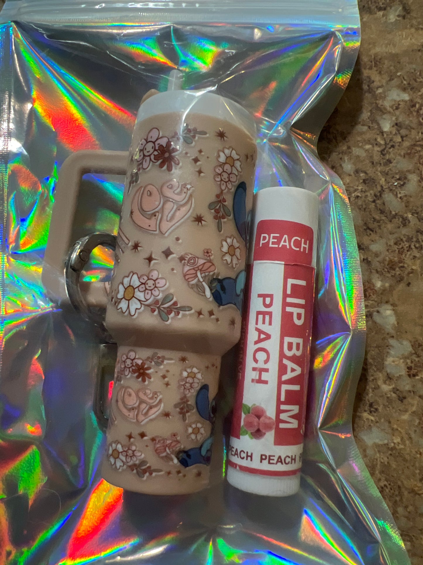 Stitch tan with rainbow flowers