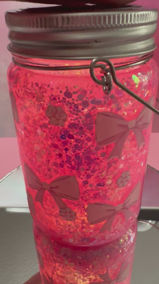 Pink bows & glitter glass snowglobe tumbler/solar light